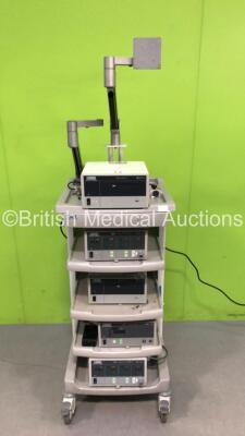 Karl Storz Stack Trolley Including 1 x Karl Storz Endoskope AIDA II 200460 20 control Unit, 1 x Karl Storz Endoskope AIDA 200960 20 control Unit, 2 x Karl Storz Endoskope 264305 20 SCB electronic endoflator Units and 1 x Karl Storz Endoskope SCB unidrive