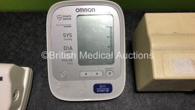 Mixed Lot Including 2 x Omron M5-I Digital BP Monitors (Both Missing Battery Casing - See Photos) 1 x Omron M6 Digital BP Monitor (Missing Battery Casing - See Photos) 1 x Braun Pro 4000 Thermometer and 1 x Welch Allyn 767 Series Transformer with 2 x Hand - 4