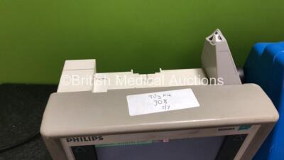 Job Lot Including 2 x GE Dinamap Pro 300V2 Vital Signs Monitors (Both Power Up with Damage to Casing, 1 x Missing Dial - See Photos) and 1 x Philips M3 M3046A Patient Monitor (Powers Up, Damaged Handle and Casing - See Photos) - 5