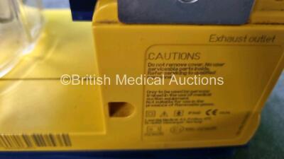 4 x Laerdal LSU Suction Units with 4 x Cups All with Missing Lids (All Power Up 1 x with Damage to Casing - See Photo) *SN 78020437670 / 78331076560 / 76331076555 / 78331076579* - 7