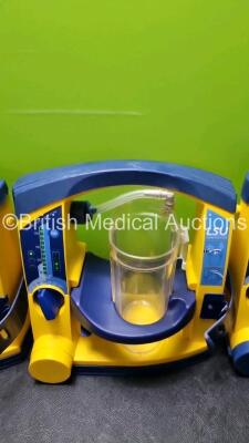 4 x Laerdal LSU Suction Units with 4 x Cups All with Missing Lids (All Power Up 2 with Damage to Casing - See Photo) *SN 78161071930 / 78161071912 / 78200441933 / 78161071921* - 3