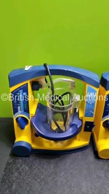 4 x Laerdal LSU Suction Units with 4 x Cups All with Missing Lids (All Power Up 2 with Damage to Casing - See Photo) *SN 78161071930 / 78161071912 / 78200441933 / 78161071921* - 5