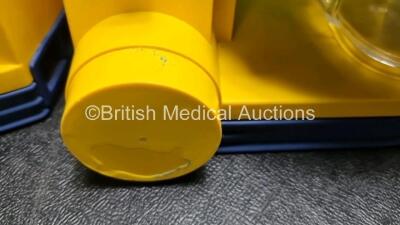 4 x Laerdal LSU Suction Units with 4 x Cups All with Missing Lids (All Power Up 2 with Damage to Casing - See Photo) *SN 78161071930 / 78161071912 / 78200441933 / 78161071921* - 6