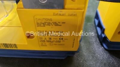 4 x Laerdal LSU Suction Units with 4 x Cups All with Missing Lids (All Power Up 2 with Damage to Casing - See Photo) *SN 78161071930 / 78161071912 / 78200441933 / 78161071921* - 8