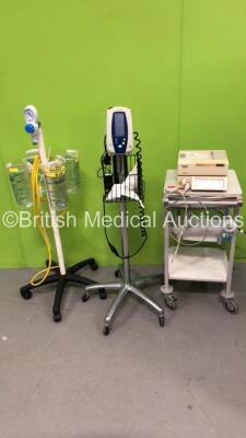 Mixed Lot Including 1 x Sonicaid Team Duo Fetal Monitor on Stand with 2 x Transducers (Powers Up with Damaged Casing-See Photo) 1 x Welch Allyn Spot Vital Sign Monitor on Stand (Powers Up with Damaged Casing-See Photo) 4 x Suction Canisters on Stand (All