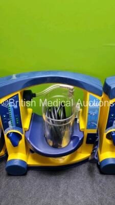 4 x Laerdal LSU Suction Units with 4 x Cups All with Missing Lids (All Power Up, 1 x Damage to Casing - See Photo) *SN 78331076561 / 78130440138 / 72870899409 / 78161071926* - 4