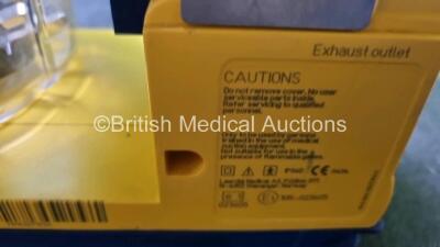 4 x Laerdal LSU Suction Units with 4 x Cups All with Missing Lids (All Power Up, 1 x Damage to Casing - See Photo) *SN 78331076561 / 78130440138 / 72870899409 / 78161071926* - 6