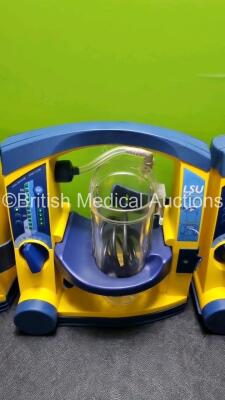 4 x Laerdal LSU Suction Units with 4 x Cups All with Missing Lids (All Power Up) *SN 78510968434 / 78151184104 / 78020437679 / 78331076562* - 4