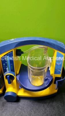 4 x Laerdal LSU Suction Units with 4 x Cups All with Missing Lids (All Power Up 1 x with Damage to Casing - See Photo) *SN 78120439944 / 78180896402 / 78331076575 / 785100968432* - 2