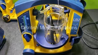 5 x Laerdal LSU Suction Units with 4 x Cups All with Missing Lids (All Power Up, 2 x Damage to Casing - See Photos) *SN 78151184105 / 78200897170 / 78130894712 / 78510968425 / 78331076559* - 2