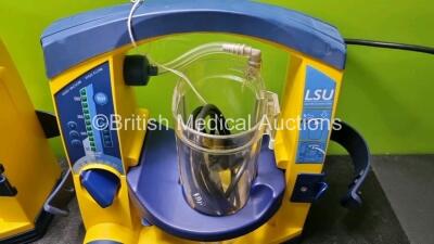 5 x Laerdal LSU Suction Units with 4 x Cups All with Missing Lids (All Power Up, 2 x Damage to Casing - See Photos) *SN 78151184105 / 78200897170 / 78130894712 / 78510968425 / 78331076559* - 6