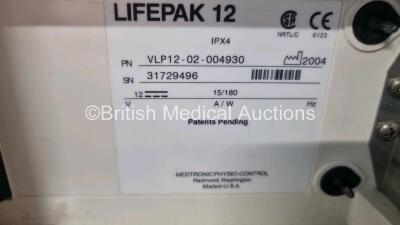 Medtronic Lifepak 12 Biphasic Defibrillator / Monitor Including Pacer, ECG and Printer Options with 3 x Batteries Ref 11141-000106 (Powers Up with Stock Battery, Stock Battery Not Included, Missing Printer - See Photos) - 5