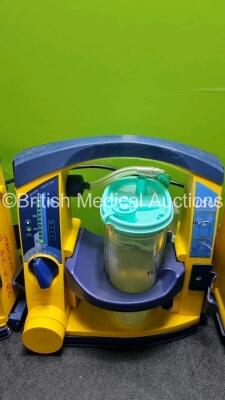 4 x Laerdal LSU Suction Units with 4 x Cups and lids (All Power Up, 3 x with Damage to Casing - See Photos) - 4