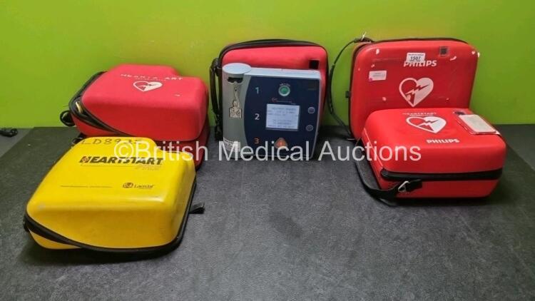 Job Lot Including 1 x Agilent FR2 Defibrillator (Powers Up with Stock Power, Stock Power Not Included) and 5 x Heartstart Defibrillator Cases (Cases Only)