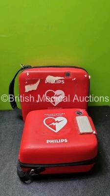 Job Lot Including 1 x Agilent FR2 Defibrillator (Powers Up with Stock Power, Stock Power Not Included) and 5 x Heartstart Defibrillator Cases (Cases Only) - 5