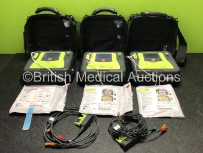 3 x Zoll AED PRO Defibrillators with 3 x Batteries, 2 x 3 Lead ECG Leads, 3 x Electrode Packs *2 x in Date, 1 x Out of Date* in Carry Cases (All Power Up) *SN AA13B027604 / AA13C027928 / AA13B027591*