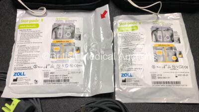 3 x Zoll AED PRO Defibrillators with 3 x Batteries, 2 x 3 Lead ECG Leads, 3 x Electrode Packs *2 x in Date, 1 x Out of Date* in Carry Cases (All Power Up) *SN AA13B027604 / AA13C027928 / AA13B027591* - 5