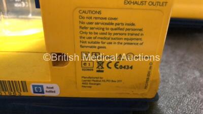 Job Lot Including 2 x Laerdal Suction Unit 20g LSU Wall Brackets (1 x Missing Adapter / Plug - See Photos) 5 x Laerdal LSU Suction Units with 5 x Cups (All Missing Lids) and 5 x Batteries (All Power Up, 3 x Missing Rubber Caps - See Photos) *78501361963 / - 9