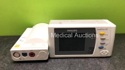 Job Lot Including 1 x Philips IntelliVue X2 Handheld Patient Monitor with ECG, SpO2, NBP, Press and Temp Options (No Power, Suspected Flat Battery) and 1 x Philips M3001A Module with ECG, SpO2 and NBP Options