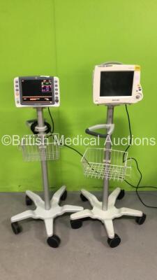 1 x GE Dash 2500 Patient Monitor on Stand with SPO2, ECG and NIBP Options (Powers Up) and 1 x Philips IntelliVue MP30 Patient Monitor on Stand (Damaged Power Button - No Power) with Philips IntelliVue X2 Monitor with Press, Temp, NBP, SPO2 and ECG/Resp Op