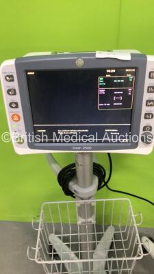 1 x GE Dash 2500 Patient Monitor on Stand with SPO2, ECG and NIBP Options (Powers Up) and 1 x Philips IntelliVue MP30 Patient Monitor on Stand (Damaged Power Button - No Power) with Philips IntelliVue X2 Monitor with Press, Temp, NBP, SPO2 and ECG/Resp Op - 2