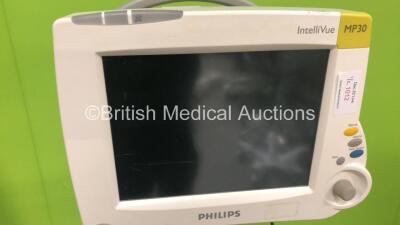 1 x GE Dash 2500 Patient Monitor on Stand with SPO2, ECG and NIBP Options (Powers Up) and 1 x Philips IntelliVue MP30 Patient Monitor on Stand (Damaged Power Button - No Power) with Philips IntelliVue X2 Monitor with Press, Temp, NBP, SPO2 and ECG/Resp Op - 5