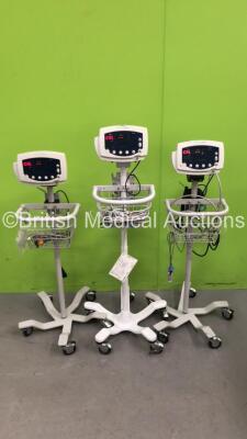 3 x Welch Allyn 53N00 Patient Monitors on Stands with 3 x AC Power Supplies and 3 x SpO2 Leads/Sensors (All Power Up)