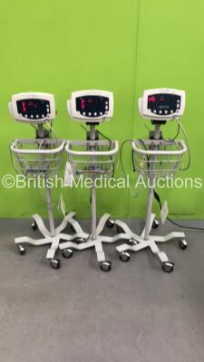 3 x Welch Allyn 53N00 Patient Monitors on Stands with 3 x AC Power Supplies and 2 x SpO2 Leads/Sensors (All Power Up)