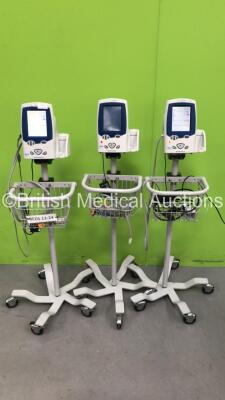 3 x Welch Allyn Spot Vital Signs LXi Patient Monitors on Stands with 3 x AC Power Supplies and 2 x SpO2 Leads/Sensors (All Power Up)