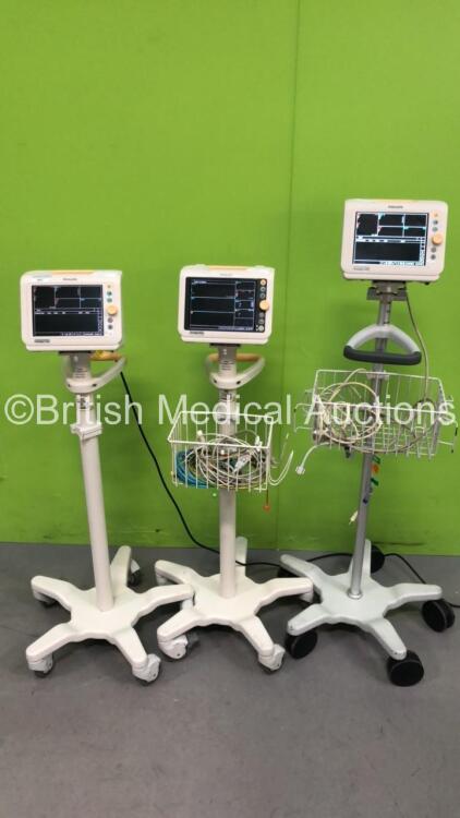 2 x Philips SureSigns VS3 and 1 x Philips SureSigns VM4 Patient Monitors on Stands (All Power Up - See Photos for Options)