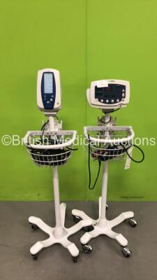 1 x Welch Allyn 53N00 and 1 x Welch Allyn Spot Vital Signs Patient Monitors on Stands (Both Power Up)