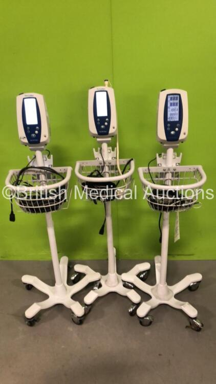 3 x Welch Allyn 53N00 Patient Monitors on Stands with 3 x AC Power Supplies and 2 x SpO2 Leads/Sensors (All Power Up)