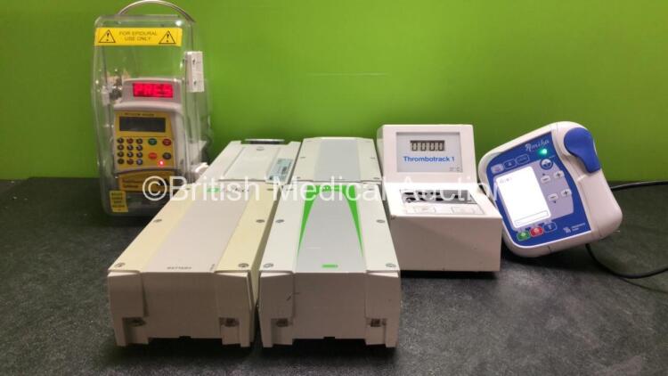 Mixed Lot Including 1 x CME Mckinley Bodyguard 545 Epidural Pump with 1 x Trigger Switch (Powers Up) 4 x Liko Hoist Batteries *All Untested* 1 x Thrombotrack 1 Coagulometer (Powers Up) 1 x Fresenius Kabi Amika External Feeding Pump with 1 x AC Power Suppl