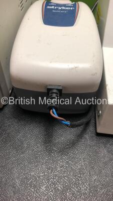 Mixed Lot Including 2 x GE Tram Rac 4A Module Racks, 1 x Medela Lactina Electric Plus Breast Pump (No Power) 1 x Ameda Egnell Breast Pump (Untested Due to Foreign Plug) 1 x Stryker SofCare Pump (Powers Up with Damaged Cable-See Photo) 1 x Thrombotrack Blo - 3