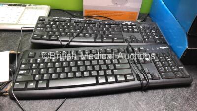 Mixed Lot Including 1 x Depuy FMS Connect Interface Cable, 1 x Heine Magnification Glasses, 1 x Netgear 5 Port Gigabit Ethernet Switch, 3 x Keyboards and 3 x Medtronics My Care Links *SN H38A30709, 081100351, 1835SY02HQ88, 1834MR11B6F8* - 5