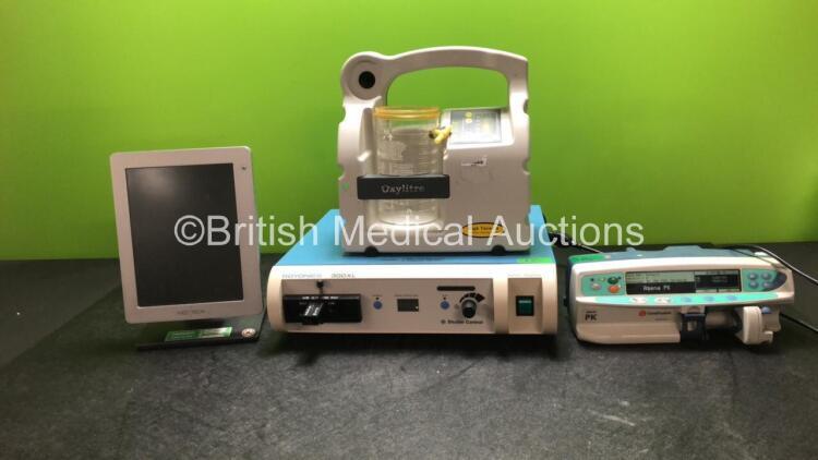 Mixed Lot Including 1 x Smith & Nephew Dyonics 300XL Xenon Light Source (Powers Up) 1 x Oxylitre PSP002 Elite High Suction Unit with Cup (Powers Up with Missing Lid-See Photo) 1 x Carefusion Alaris PK Pump (Powers Up) 1 x Medtron Accutron MR Touch Screen