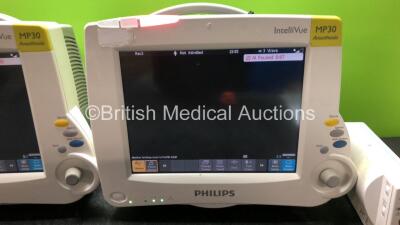 2 x Philips MP30 Anesthesia Patient Monitors with 1x Philips M3001A Module Including ECG, SpO2, NBP, Press and Temp Options and 1 x Philips M3012A Module Including Press and Temp Options (Both Power Up) - 3