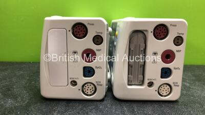 2 x Philips IntelliVue X2 Handheld Patient Monitors Including ECG, SpO2, NBP, Press and Temp Options with 2 x Philips M4607A Batteries (Both Power Up, 1 Damaged 1 with Missing Battery Cover) - 4