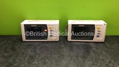 2 x Philips IntelliVue X2 Handheld Patient Monitors Including ECG, SpO2, NBP, Press and Temp Options with 2 x Philips M4607A Batteries (Both Power Up, Both with Damaged and 1 Flat Battery-See Photos)