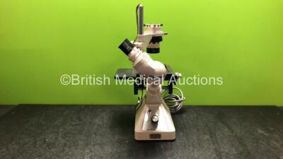 Olympus P240 Microscope with 3 x Optics *1 x Olympus C20 0.40 1.20 Optic, 1 x Olympus 4 0.10 Optic and 1 x Olympus 10 0.25 Optic* (Untested Due to Damaged Plug-See Photo) *SN NA*