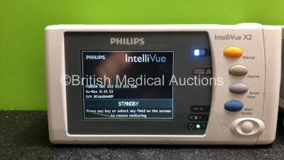 2 x Philips IntelliVue X2 Handheld Portable Patient Monitors Including ECG, SpO2, NBP, Press and Temp Options (Both Power Up when tested with Stock Batteries-Batteries Not Included) *SN DE466G4489, DE03797502* - 2