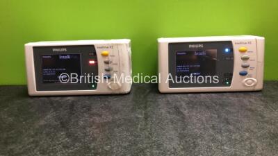 2 x Philips IntelliVue X2 Handheld Portable Patient Monitors Including ECG, SpO2, NBP, Press and Temp Options (Both Power Up when tested with Stock Batteries-Batteries Not Included) *SN DE315F0144, DE03796929*