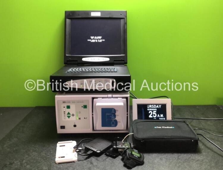 Mixed Lot Including 1 x Covidien Rapidvac Smoke Evacuator Unit (Powers Up) 1 x Vision Sciences DPU-7000A Camera Control Unit (Powers Up) 1 x YCOO Digital Calendar Day Clock with Power Supply (Powers Up with Damaged Screen-See Photo) 1 x Nonin Wristox2 Met