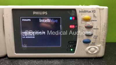 2 x Philips IntelliVue X2 Handheld Portable Patient Monitors Including ECG, SpO2, NBP, Press and Temp Options (Both Power Up with Stock Batteries, Batteries Not Included, 1 x Damage to Casing - See Photos) - 3