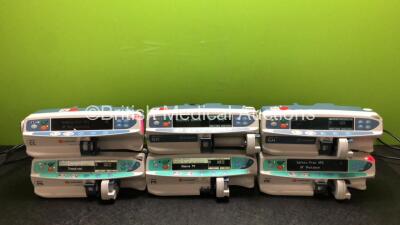 Job Lot Including 3 x CareFusion Alaris PK Syringe Pumps (All Power Up, 1 x SP3 Code) 2 x CareFusion Alaris GH Plus Syringe Pumps (Both Power Up, 1 x Requires Service) and 1 x CareFusion Alaris CC Syringe Pump (Powers Up with SP1 Code)