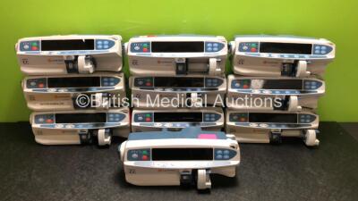 Job Lot Including 7 x CareFusion Alaris CC Syringe Pumps and 3 x CareFusion Alaris GH Syringe Pumps (All Power Up, 5 x Require Service, 1 x Damaged Casing - See Photos)