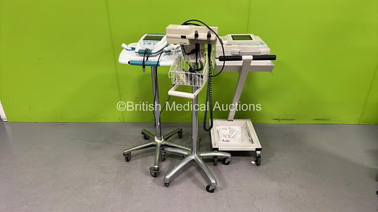 Mixed Lot Including 1 x Verathon BVI 9400 Bladder Scanner with Transducer / Probe on Stand, 1 x GE MAC 1200ST ECG Machine on Trolley and 1 x Welch Allyn Otoscope / Ophthalmoscope Set on Stand (No Heads) *06293 / 550009352 / B4307627*