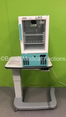 Lec Medical Fridge on Ophthalmic Table (Powers Up)