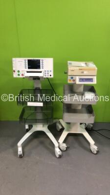 1 x Huntleigh Sonicaid FM800 Encore Fetal Monitor on Stand and 1 x Sonicaid Team Duo Fetal Monitor on Stand (Both Power Up)