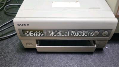 Mixed Lot Including 1 x Haematocrit Centurion Centrifuge Unit, 1 x Vitalograph Calibration Syringe, 1 x Sony UP-55MD Colour Video Printer, 1 Data Switch Label Printer, 2 x Viamed SpO2 Finger Probes, 1 x Nellcor Pulse Oximetry Interface Cable, 1 x Nellcor - 6